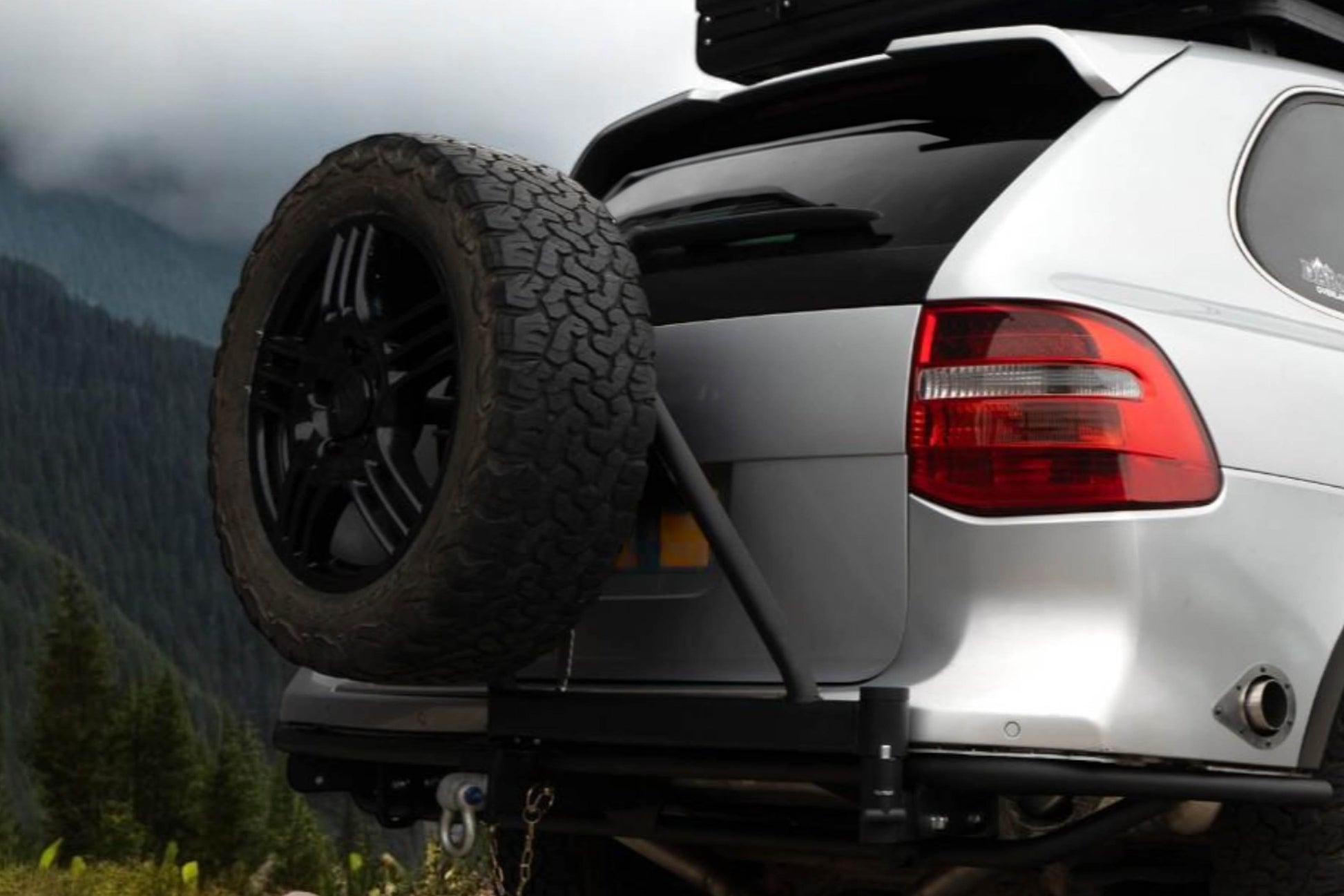 porsche cayenne zilver reservewieldrager achterkant